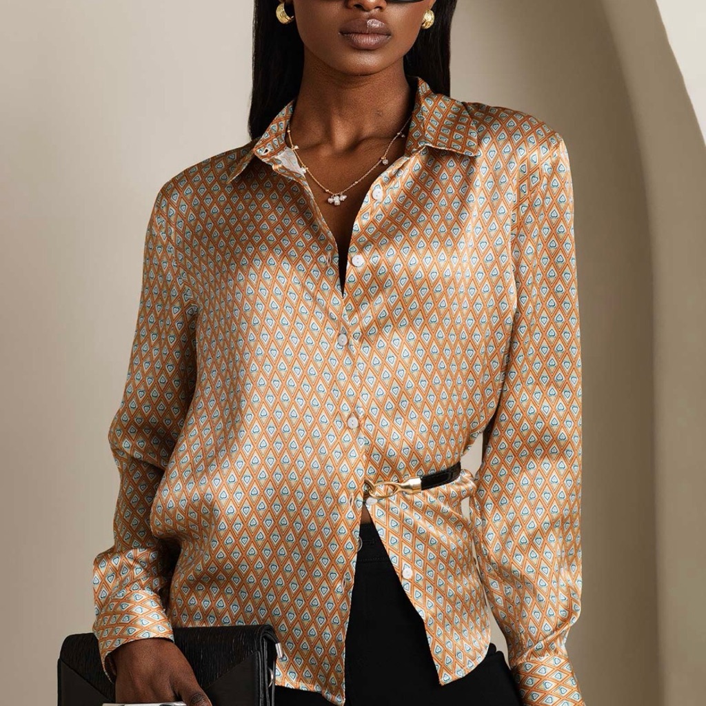 Elegant Orange And Cream Diamond Blouse